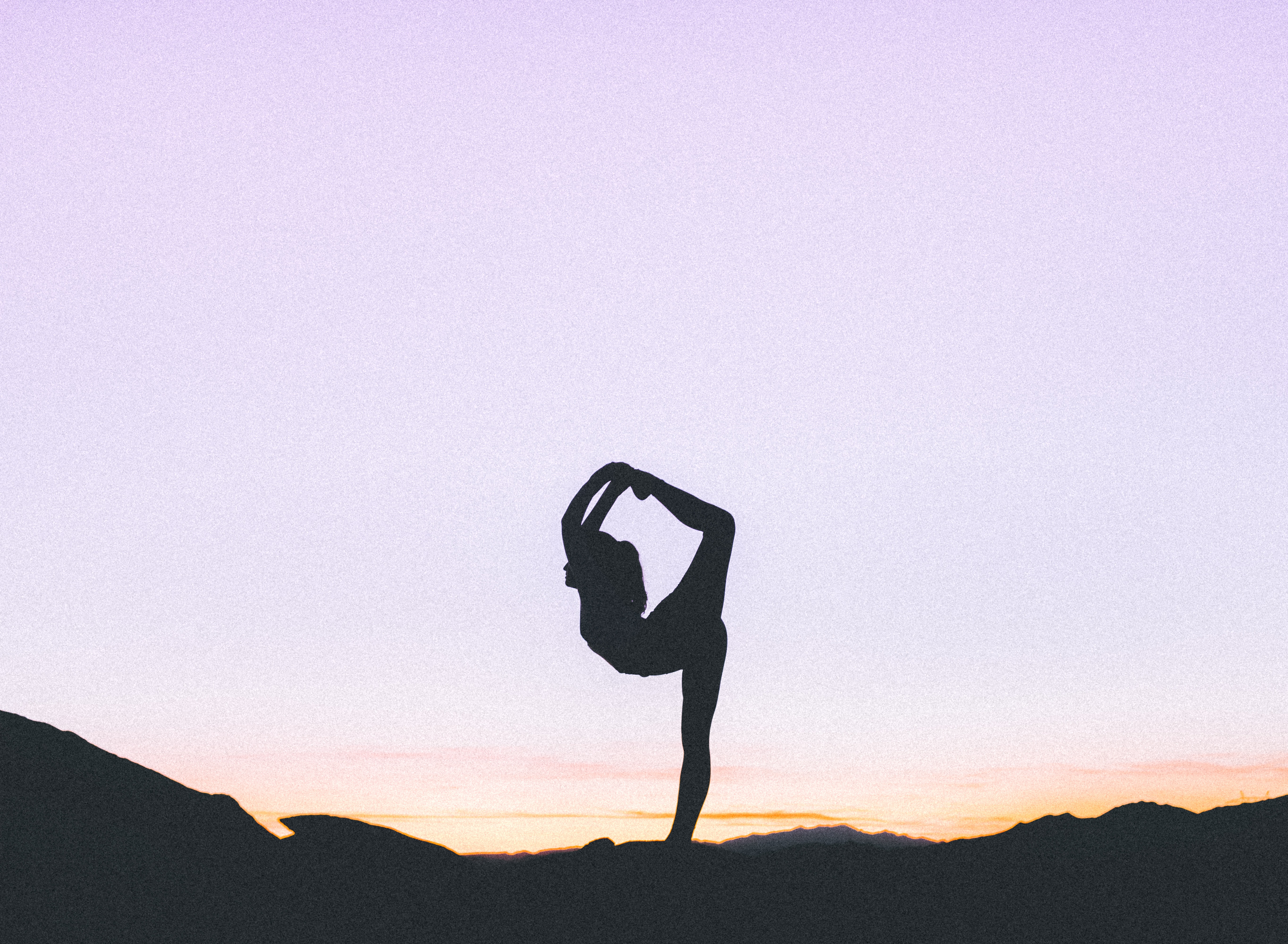 Image of a person doing a yoga pose.